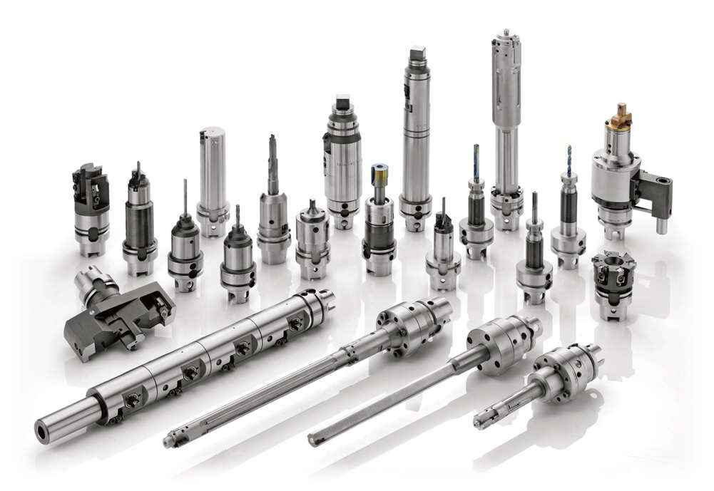 Accuromm precision machining involves cutting, milling, turning, electrical discharge machining using CNC equipment.